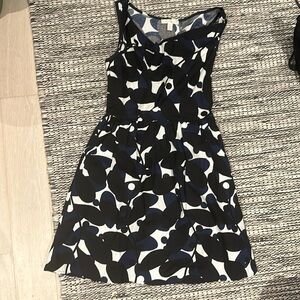 Black, white and blue cowl neck dress with pockets